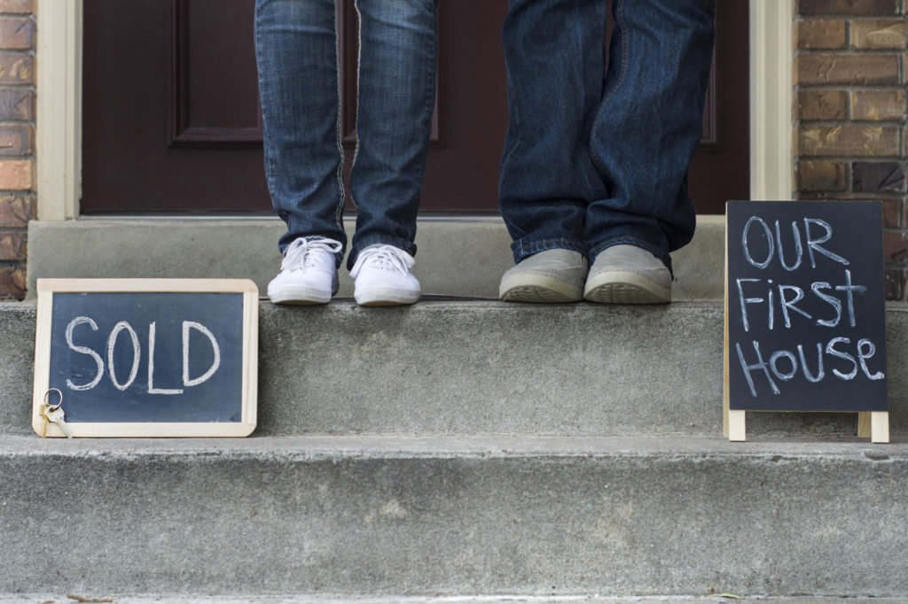 sold and our first house signs